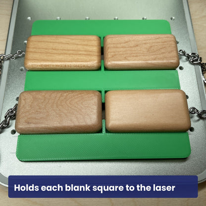 Wood rectangle keychain blanks seated square in the Samcraft jig, ready to engrave.