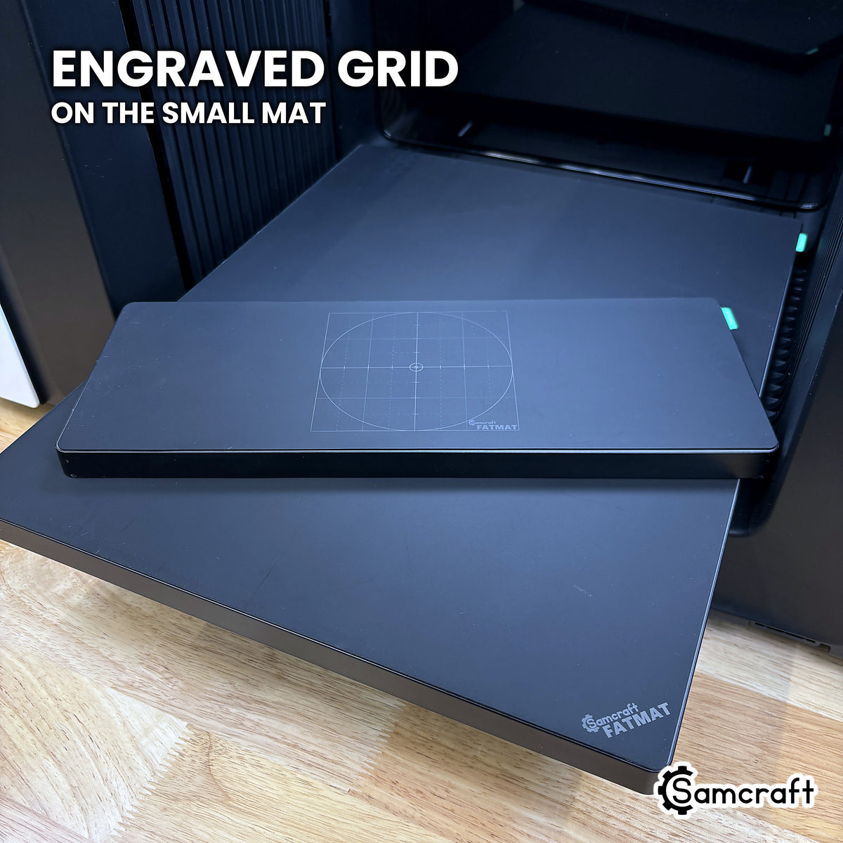 Engraved grid and center crosshair on the small Samcraft FatMat for the xTool Omni.