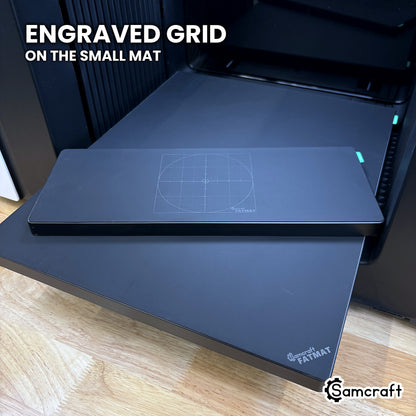 Engraved grid and center crosshair on the small Samcraft FatMat for the xTool Omni.
