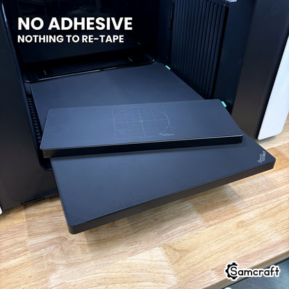 Samcraft FatMat sitting on the xTool Omni bed with no adhesive and nothing to re-tape between runs.